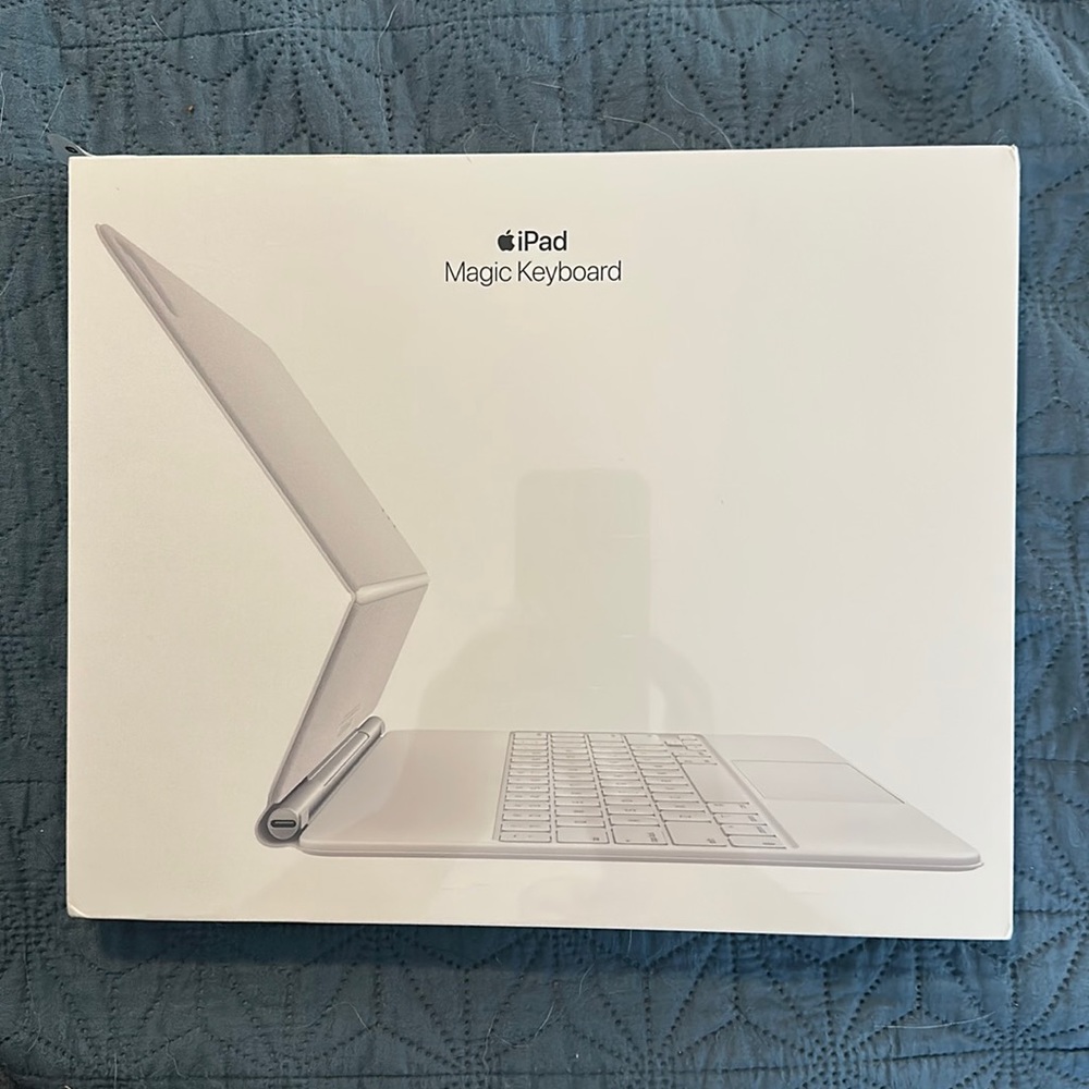 New in original package IPad Magic Keyboard in White.